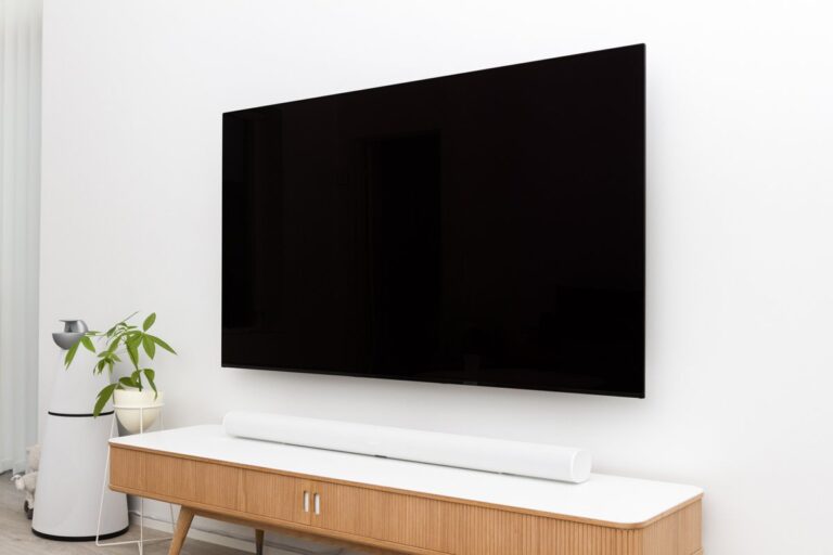 Large flat-screen television in a living room showing things that are 44 inches long