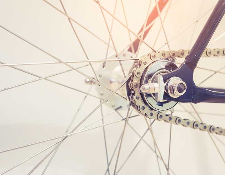 Bicycle wheel close up, a 700c wheel counted among things that are 28 inches long