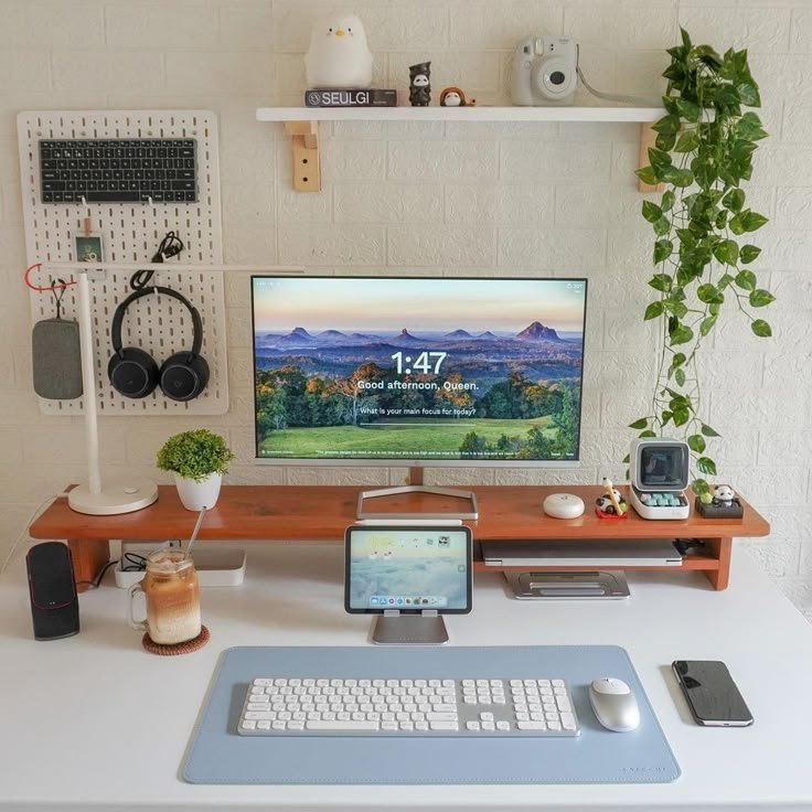 Computer desk setup with monitor among things that are 55 inches long