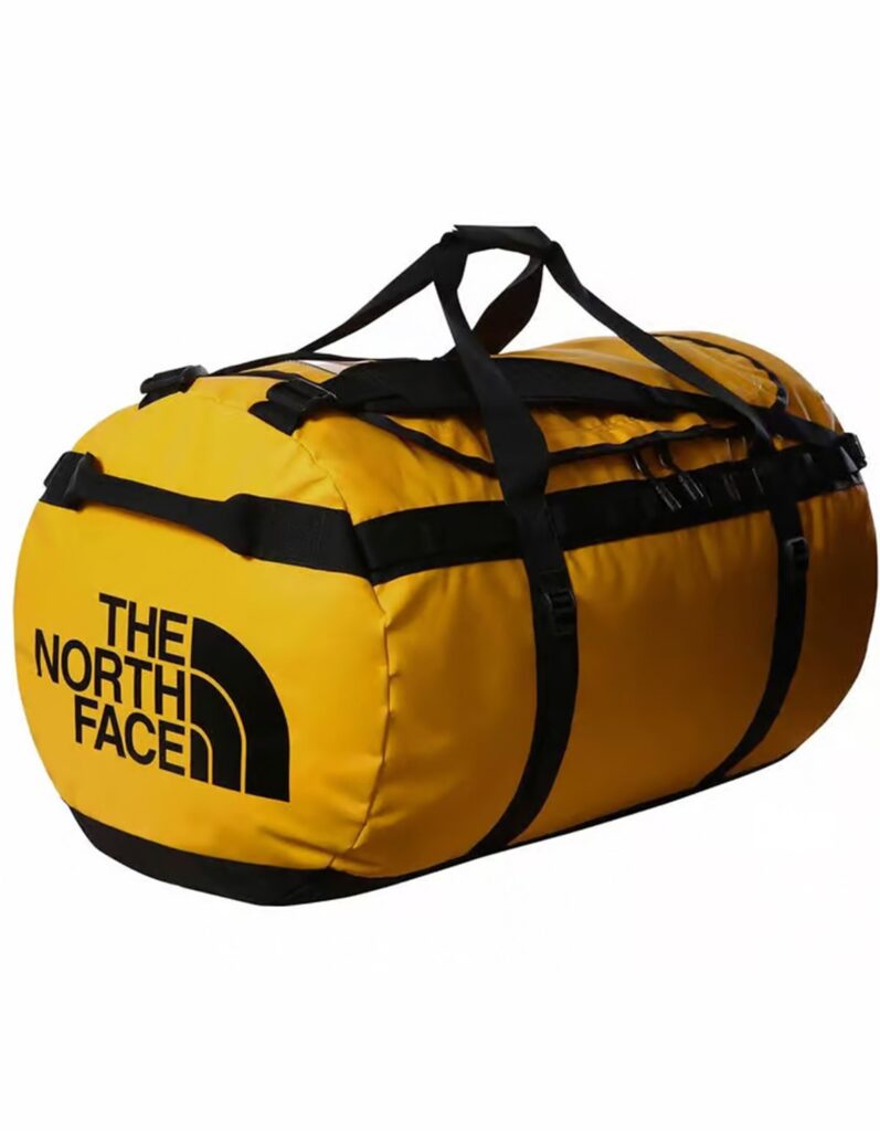 Large yellow duffel bag among things that are 51 inches long