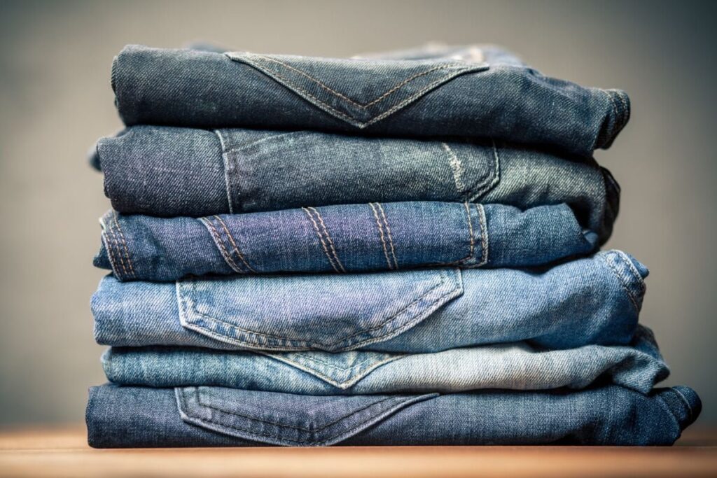 Folded blue jeans with a 32 inches long inseam, among the things that are 32 inches long