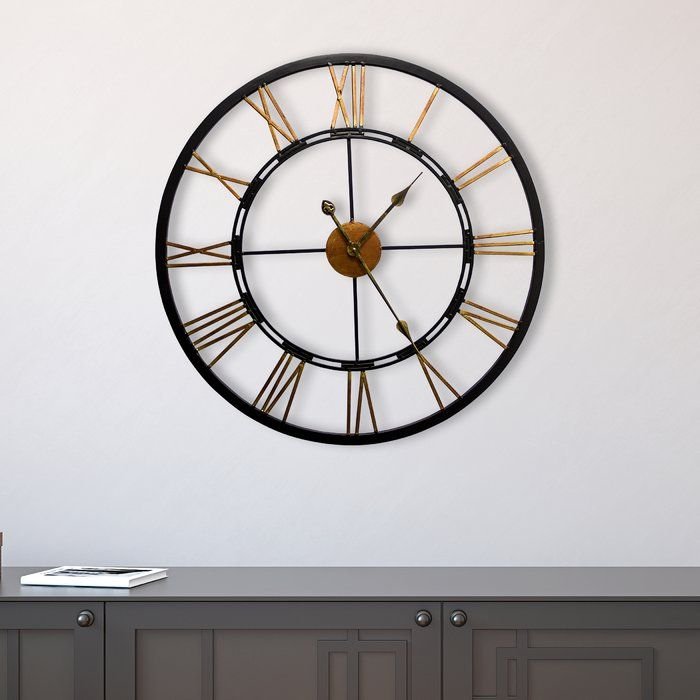 Large wall clock mounted on a wall — things that are 43 inches long