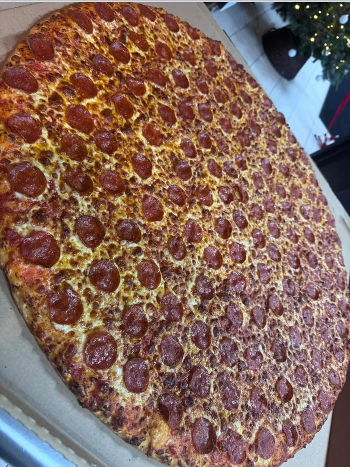 extra-large pizza about 22 inches wide on a pan, one of the common things that are 22 inches long