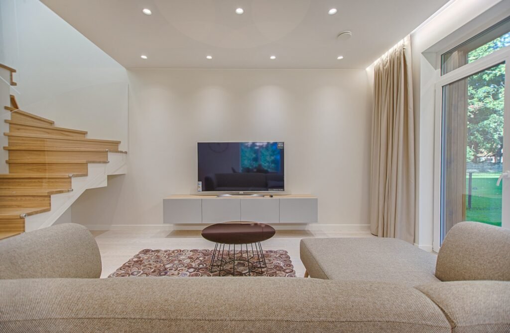 Large flat-screen television in a living room showing things that are 48 inches long
